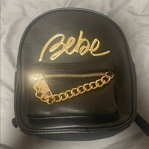 Bebe Women's Backpack in Black with Gold Chain Detail